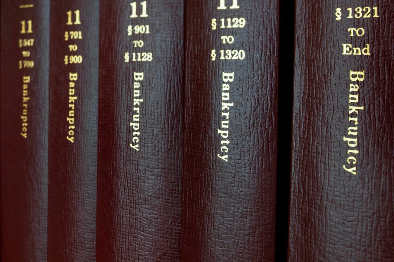 A close up of several books on bankruptcy